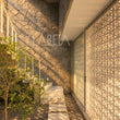Muro de Piedra Gris Diamantada irregular con sol de tarde — ambientación digital sobre instalación real | Piedras Labeta